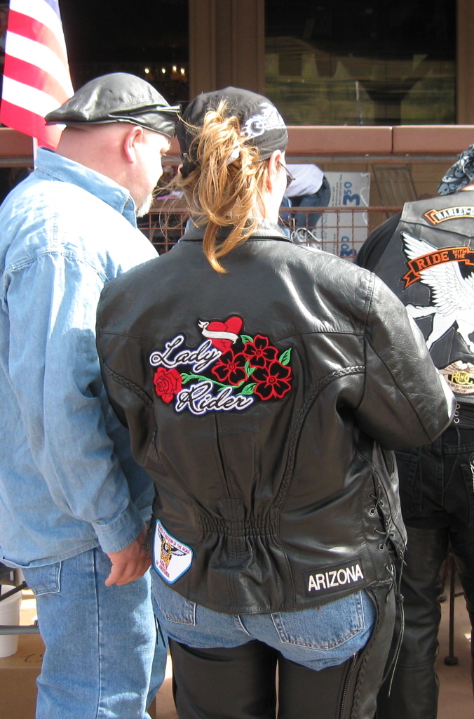 Biker Style — Leather biker jacket and riding trousers, contemporary motorcycle-rally photograph — Phoenician Patriot — Wikimedia Commons / CC BY-SA 3.0