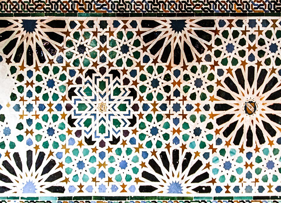Islamic Geometric Pattern — Tilework at the Alhambra (CC BY 2.0) · © Sharon Mollerus