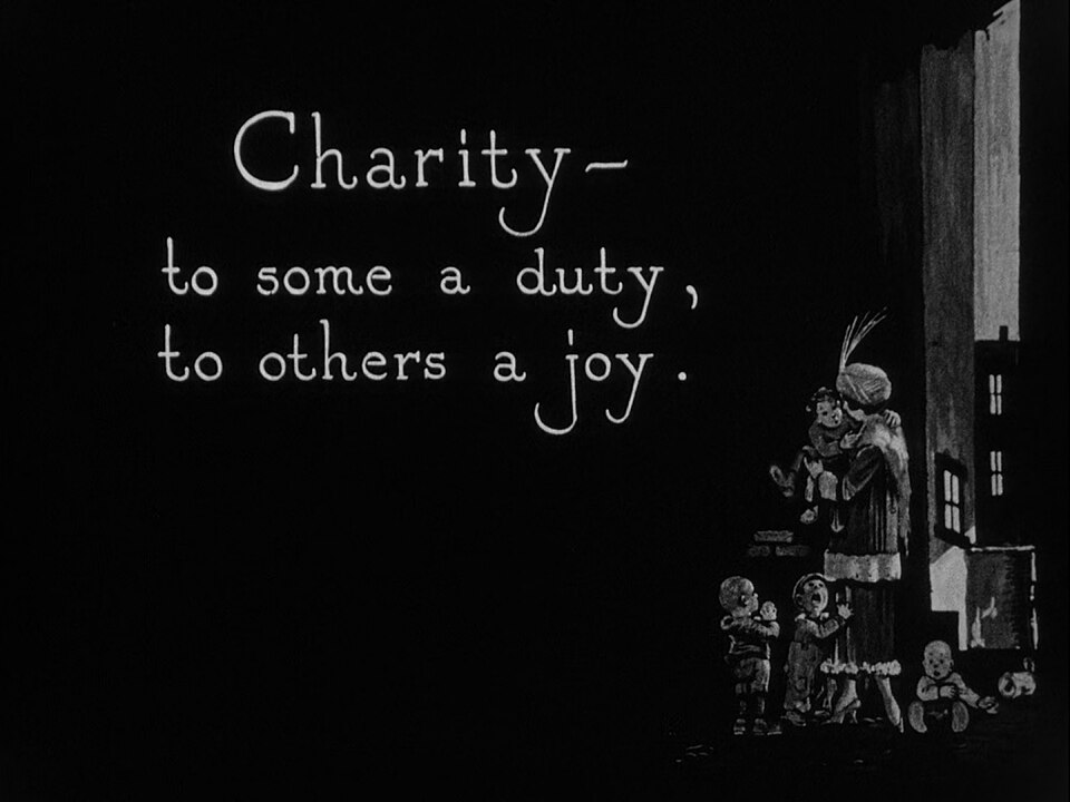 Silent Film Intertitle — Intertitle from Chaplin's The Kid, 1921 — Wikimedia Commons / Public domain